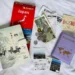 quel budget pour un voyage au Japon, photo flatlay avec un carnet de voyage, une carte du Japon, des yens, des tickets de caisse japonais, un passeport